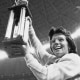 Billie Jean King holds the winner's trophy after she defeated Bobby Riggs on Sept. 20, 1973.